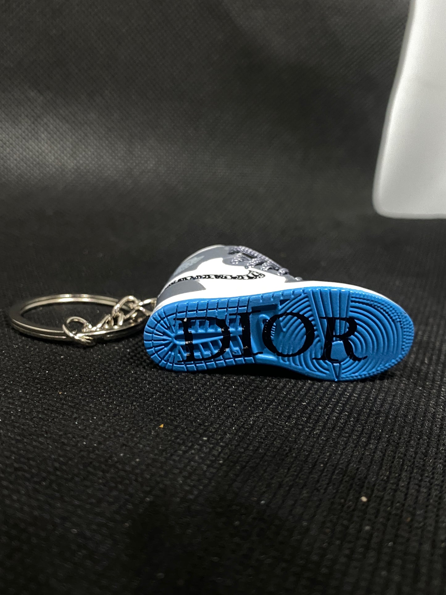 Grey Dior Keychain